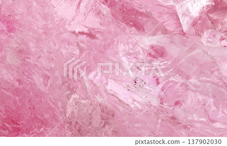 amethyst crystal displays frozen textures with cool Pink hues. The icy surface of the gemstone 137902030