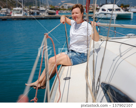 Adult Woman Enjoying Sunny Day On Yacht Finike Marina Turkey Adult Woman Enjoying Sunny Day On Yacht Finike Marina Turkey 137902107