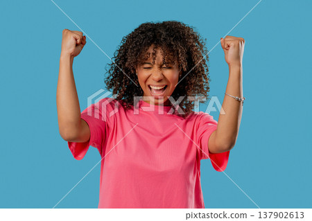 African Teen Girl Makes Victory Gesture Yes, Clenched Fist, Joy Triumphant Lady 137902613