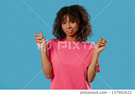 Sarcastic African Woman, Hands Two Fingers Air Quotes Gesture On Blue, Sarcasm Sarcastic African Woman, Hands Two Fingers Air Quotes Gesture On Blue, Sarcasm 137902622