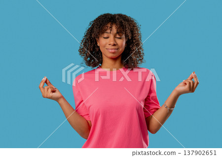 Tranquil Biracial Teenage Girl Relaxing, Meditating, Refuses Stress. Charming Tranquil Biracial Teenage Girl Relaxing, Meditating, Refuses Stress. Charming 137902651