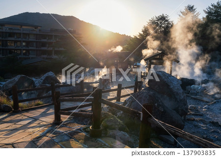 Mount Unzen Hell valley Jigoku trail with sulfur gas at sunset, Nagasak Mount Unzen Hell valley Jigoku trail with sulfur gas at sunset, Nagasak 137903835