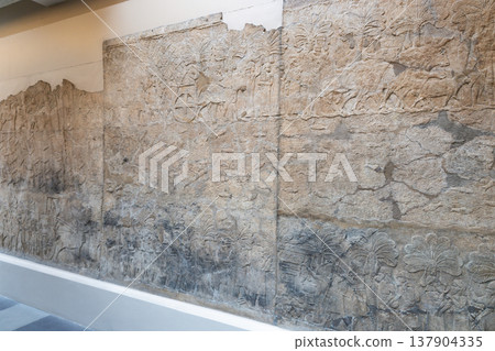 Ancient Assyrian stone relief in the British Museum, London, UK Ancient Assyrian stone relief in the British Museum, London, UK 137904335