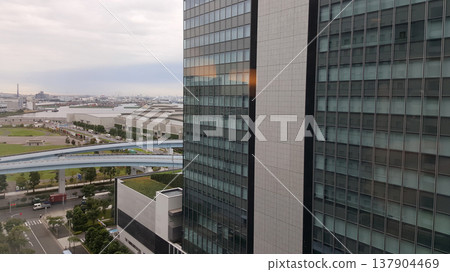 The view of Tokyo from a building window, showing dense urban skyline, rooftops, streets and distant skyscrapers The view of Tokyo from a building window, showing dense urban skyline, rooftops, streets and distant skyscrapers 137904469