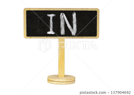 Small Decorative Miniature Wooden Stand Blackboard Sign with Handwritten Chalk Letters IN Isolated on Clean White Background with Ample Copy Space for Business or Cafe Use 137904692