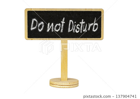 Do Not Disturb Handwritten White Chalk Text on Small Rustic Wooden Blackboard Sign Mounted on Stand Isolated on Clean White Background with Copy Space for Design Do Not Disturb Handwritten White Chalk Text on Small Rustic Wooden Blackboard Sign Mounted on Stand Isolated on Clean White Background with Copy Space for Design 137904741
