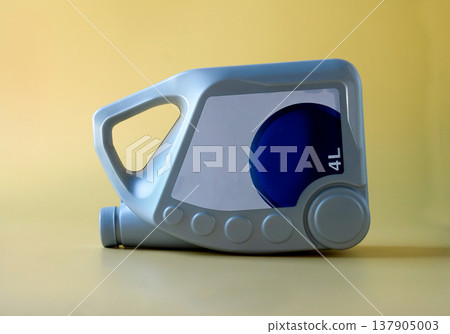 Gray Engine oil canister on color background. 137905003