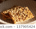 Healthy soft cookie with seeds and flax, wholesome snack on table 137905424