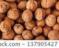 Walnuts close up background, top view natural food texture 137905427