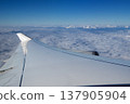Frankfurt, Germany, 03 November 2017: Airplane wing and engine above the clouds 137905904