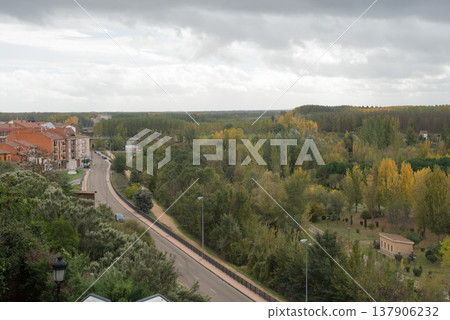 Green park around Benavente and main road, city on the background Green park around Benavente and main road, city on the background 137906232