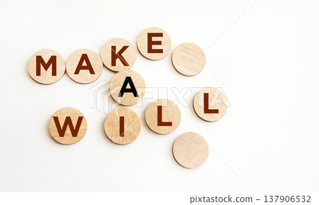 Draw up the text of the will on wooden coins and a white background Draw up the text of the will on wooden coins and a white background 137906532