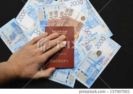 passport of a Russian citizen and 5000 Russian ruble banknotes passport of a Russian citizen and 5000 Russian ruble banknotes 137907001