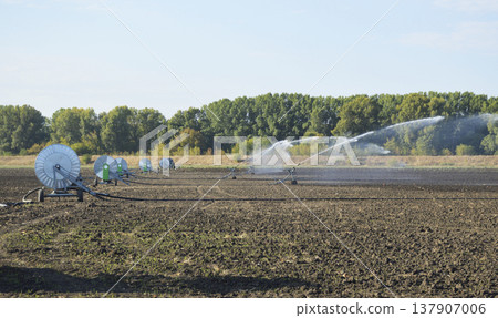 self-propelled irrigation system for industrial irrigation agricultural fields self-propelled irrigation system for industrial irrigation agricultural fields 137907006
