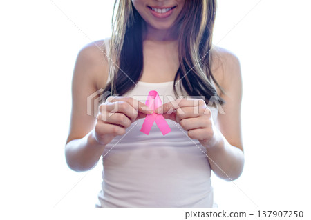 Woman holding a pink ribbon, breast cancer screening, early detection, recommended, image Woman holding a pink ribbon, breast cancer screening, early detection, recommended, image 137907250