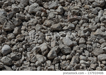 Gray gravel and crushed stone texture background Gray gravel and crushed stone texture background 137910486