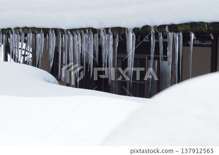 Icicles on a house in Miyama 137912565