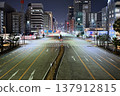 The main streets of Nagoya are enveloped in silence, and the city's night view is devoid of cars. 137912815