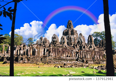 The breathtaking view of the human face rock at Angkor Thom The breathtaking view of the human face rock at Angkor Thom 137912981