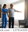 Senior male and care worker 137914309