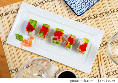 Uramaki with tobico topping Uramaki with tobico topping 137914976