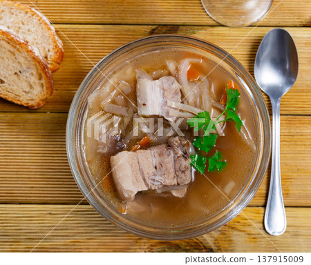 Shchi soup with beef served in bowl Shchi soup with beef served in bowl 137915009