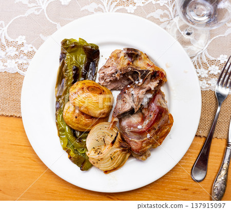 Fried fatty and juicy lamb and vegetable side dish of potato and bell pepper Fried fatty and juicy lamb and vegetable side dish of potato and bell pepper 137915097