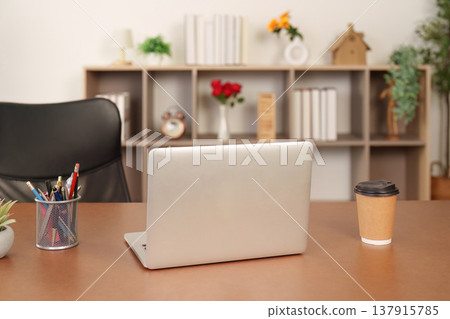 Minimalist workspace with laptop and coffee cup Minimalist workspace with laptop and coffee cup 137915785