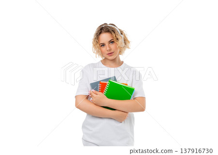 A woman stands holding three notebooks, isolated, PNG A woman stands holding three notebooks, isolated, PNG 137916730