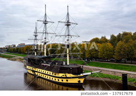 Three-masted schooner off the coast. 137917679