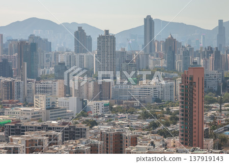 Expansive Kowloon City District Spreads Beneath Mountainous Horizon March 16 2026 137919143
