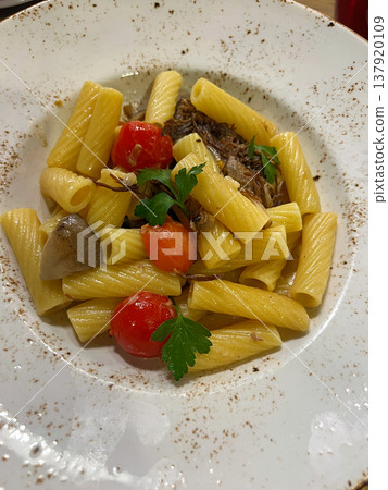 Rotini pasta with meat, mushrooms and tomatoes 137920109