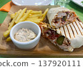 Shawarma with tartar sauce and French fries 137920111