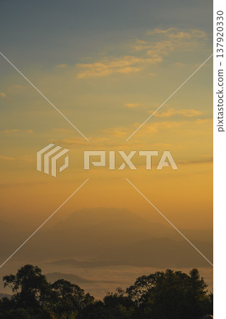 sunrise with moving of cloud and clear sky and layer of mountain sunrise with moving of cloud and clear sky and layer of mountain 137920330