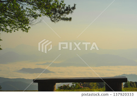 sunrise with moving of cloud and clear sky and layer of mountain sunrise with moving of cloud and clear sky and layer of mountain 137920333