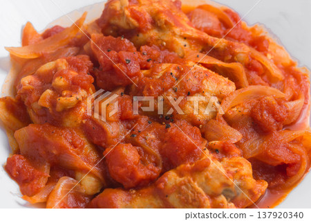 Chicken wings stewed in tomato sauce Chicken wings stewed in tomato sauce 137920340
