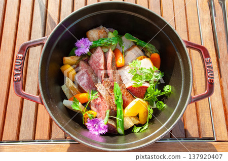 Meat and vegetable dishes made in a Dutch oven Meat and vegetable dishes made in a Dutch oven 137920407