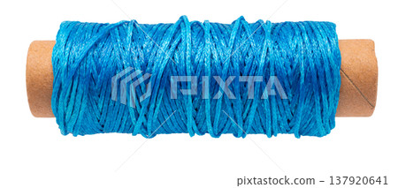 spool of colored thread on a white isolated background spool of colored thread on a white isolated background 137920641