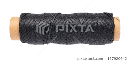 spool of colored thread on a white isolated background 137920642