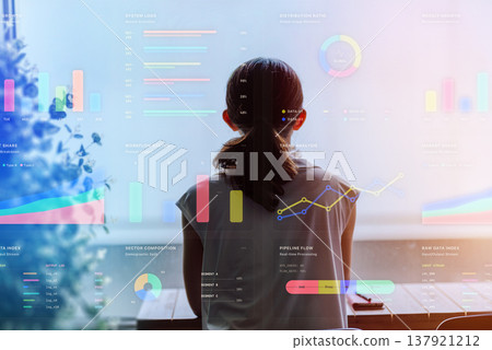 Rear view of a woman looking out the window 137921212