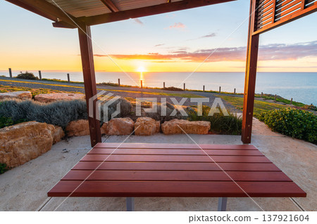 Sunset view from picnic shelter over coastal trail, Hallett Cove, South Australia 137921604