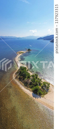 Drone aerial footage of Mizushima, an uninhabited island in Tsuruga City, Fukui Prefecture, often referred to as the "Hawaii of Hokuriku." Ideal for tourism promotion and showcasing scenic spots. Drone aerial footage of Mizushima, an uninhabited island in Tsuruga City, Fukui Prefecture, often referred to as the "Hawaii of Hokuriku." Ideal for tourism promotion and showcasing scenic spots. 137923315