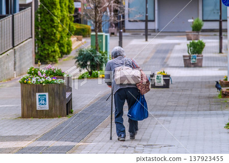 Yokohama, Japan: A cityscape of rolling hills... wooden benches... an aging society. An elderly woman with a cane... what is life...? = Yokohama city 137923455