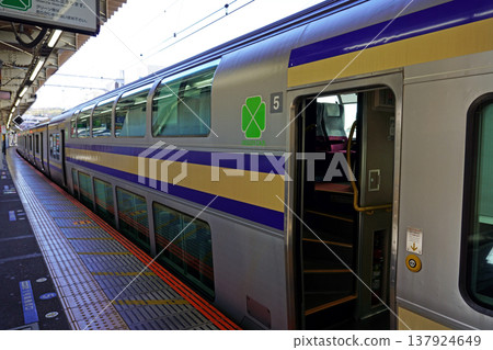 A JR Yokosuka Line Green Car waiting to depart at Zushi Station. A JR Yokosuka Line Green Car waiting to depart at Zushi Station. 137924649