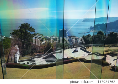 View of the sparkling sea outside the window from the MOA Museum of Art lobby 137924762