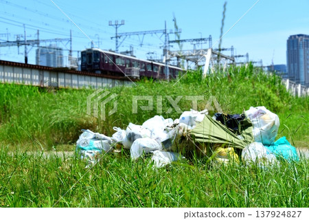 Illegal dumping of riverbed Illegal dumping of riverbed 137924827