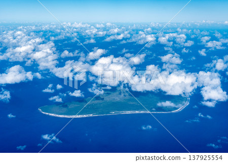 Aerial view of Makatea Island surrounded by clouds, French Polynesia Aerial view of Makatea Island surrounded by clouds, French Polynesia 137925554
