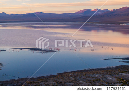 Tranquil lake and mountain sunset with water reflection, beautiful peaceful landscape Tranquil lake and mountain sunset with water reflection, beautiful peaceful landscape 137925661