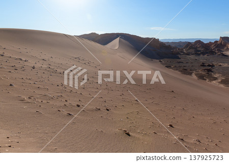 Serene sand dune desert landscape in Valle de la Luna, Atacama Serene sand dune desert landscape in Valle de la Luna, Atacama 137925723