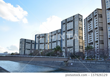 A residential cityscape with buildings from the Ashiyahama housing complex. 137926129